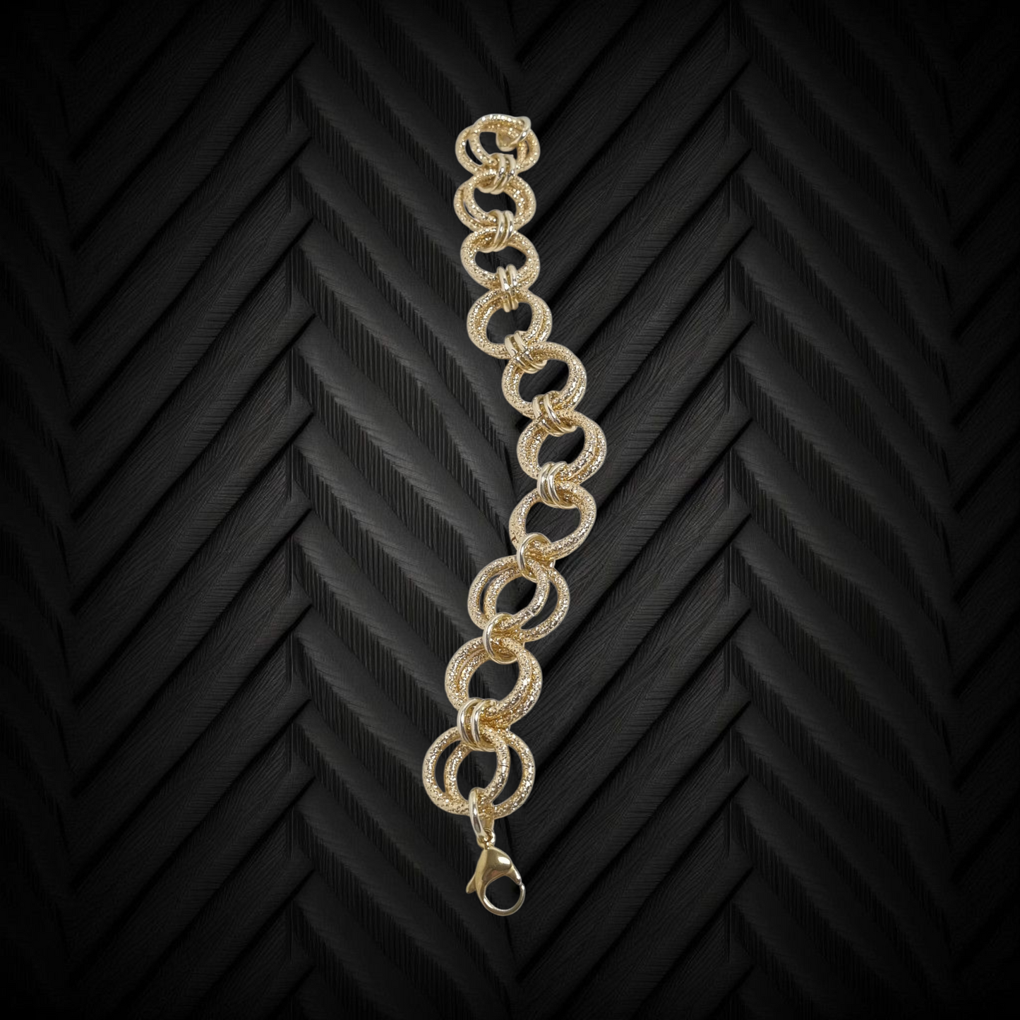 Bracciale GRACE .035 Maglie dorate lisce e ruvide legate insieme