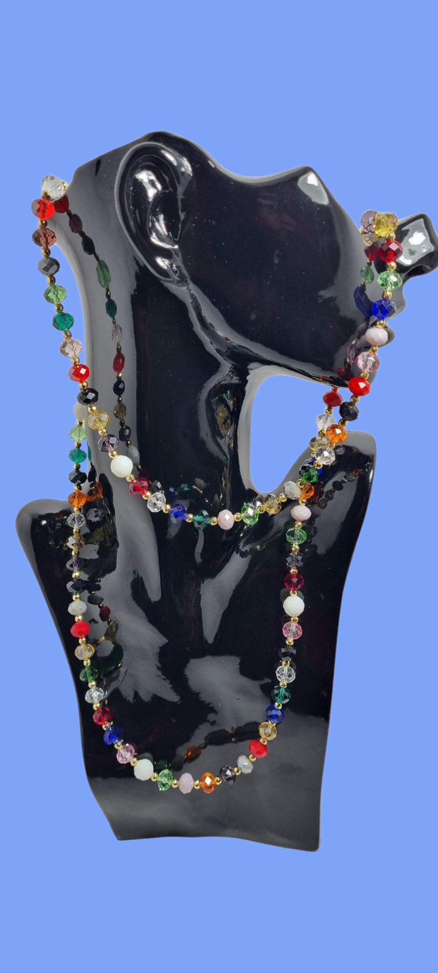 Collana I CRISTALLI .043b un lungo filo di cristalli grandi colorati e perline oro.