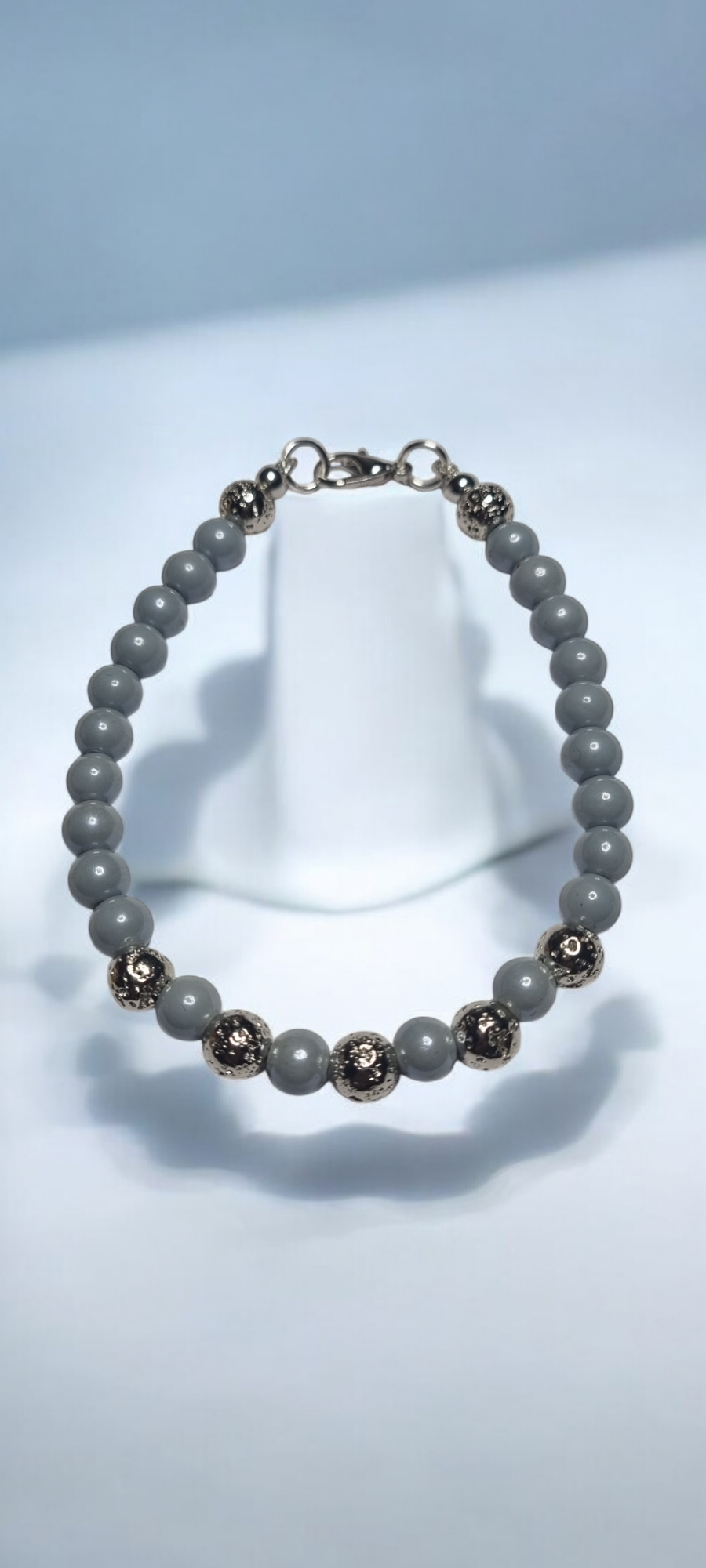 Bracciale UOMO .012 filo di perline acciaio e vetro celeste