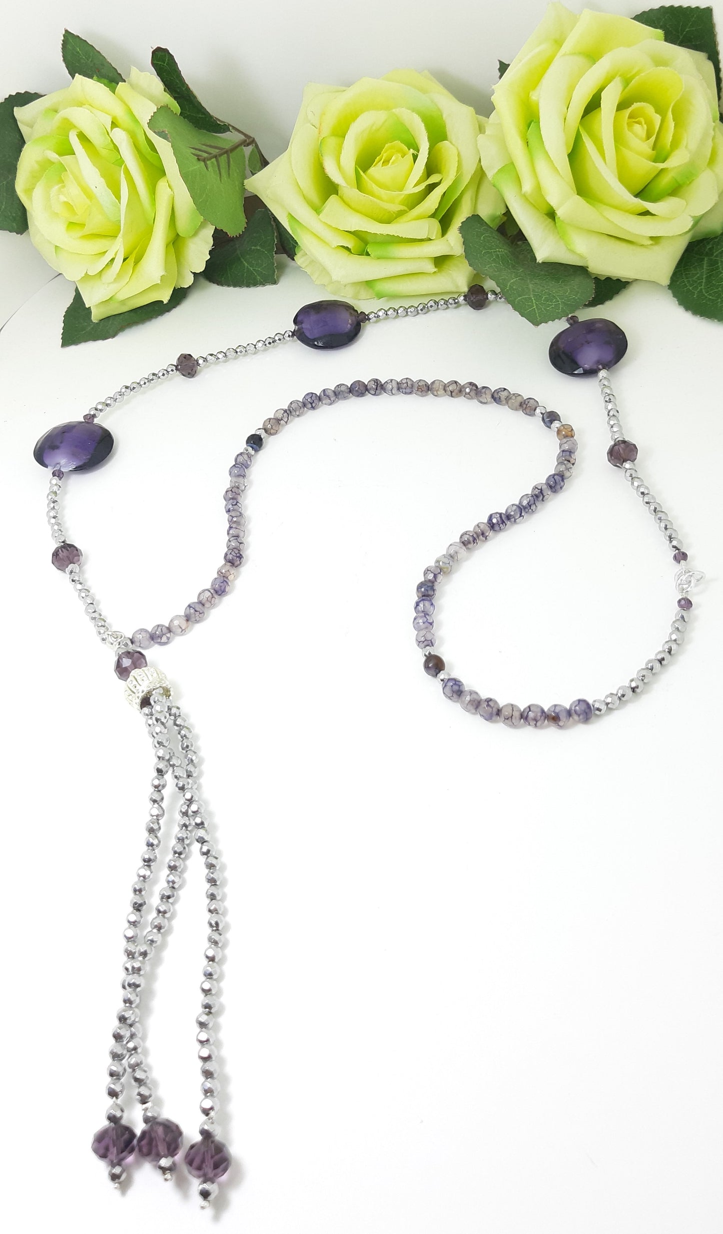 Orecchini ZELDA .036 lunghi in ematite color argento e cristallo viola.