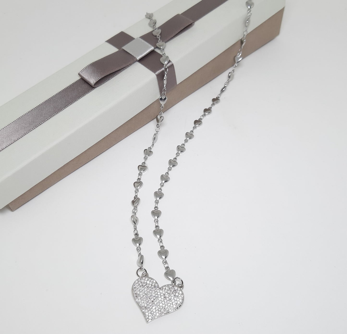 Collana AMORE .002 acciaio cuoricini e strass.