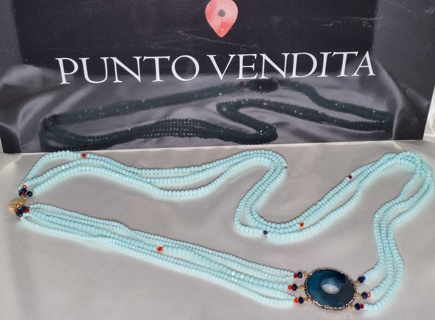 LUXURY collana .025 lunga multifilo cristalli azzurro acqua con elemento in pietra blu.