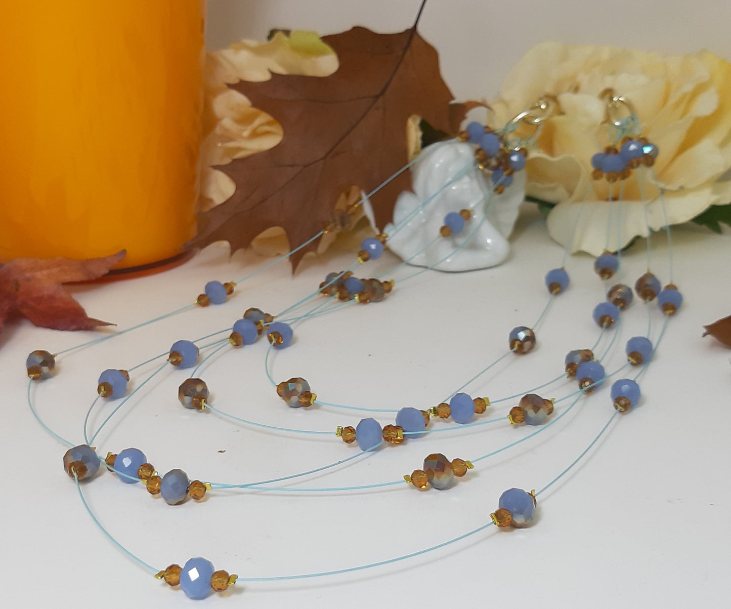 Collana I CRISTALLI .079 cristalli azzuro-bronzo melange sospesi.