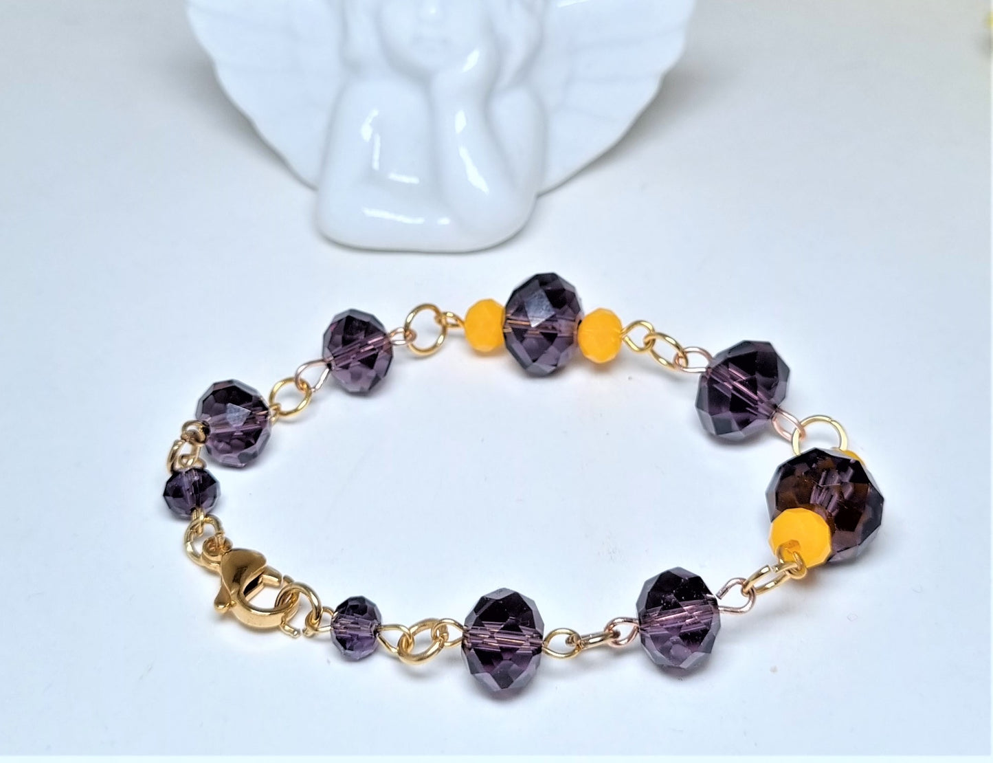 Collana I CRISTALLI .102 un filo cristalli austriaci tre misure, viola, giallo, malva ciondolo ametista.