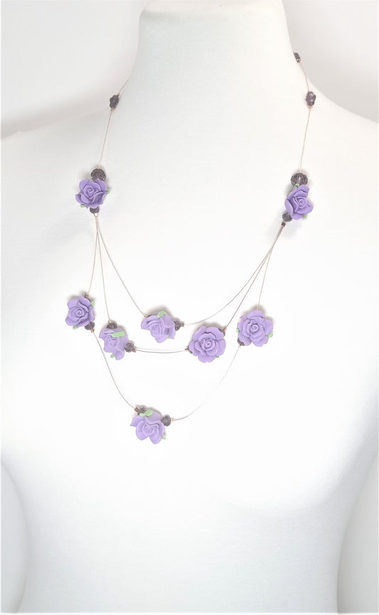 Collana LE ROSE .005 sospese ad un filo otto rose viola.