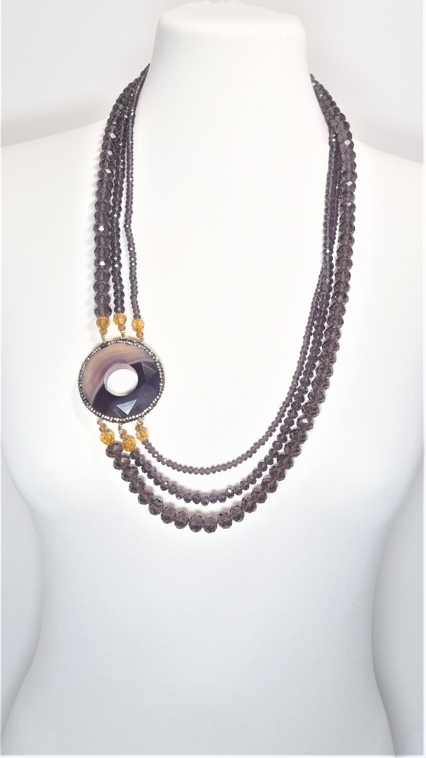 Collana I CRISTALLI .101 tre fili cristalli austriaci, quarzo viola,marcassite.