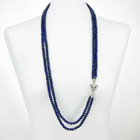 Collana I CRISTALLI .012,  due fili mezzi cristalli blu screziati con elemento separatore metallo.