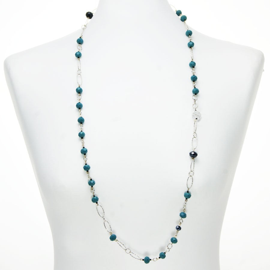 Collana I CRISTALLI .014, mezzi cristalli colore verde-azzurro, cristalli trasparenti e neri.