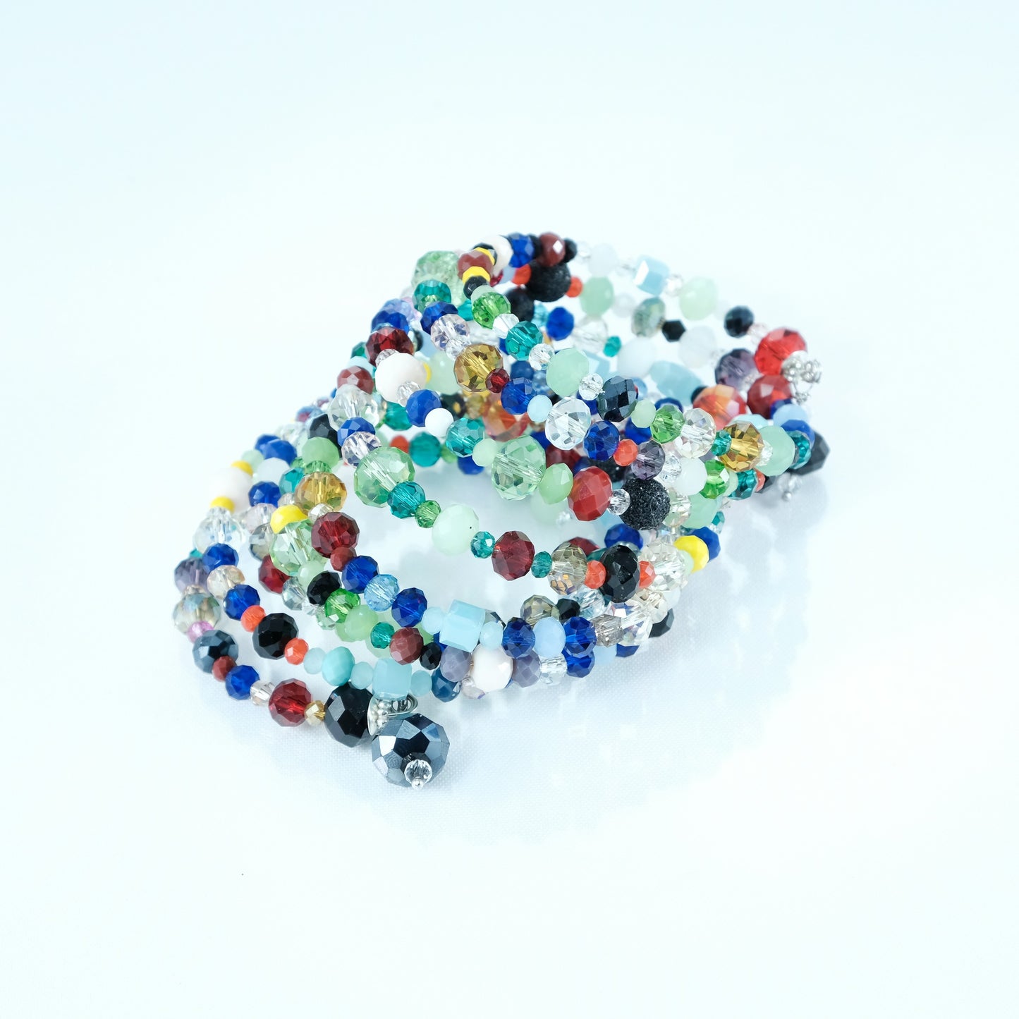 Bracciale I CRISTALLI .031 spirale a nove giri cristalli multicolori.