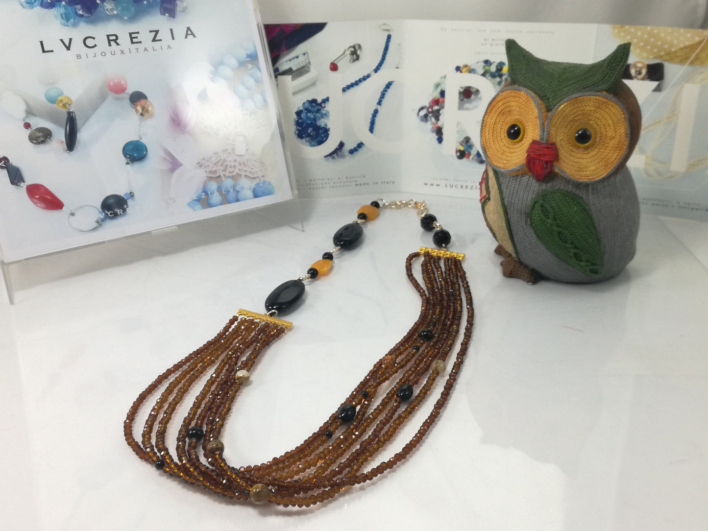 Collana ZELDA .056 cristalli perle quarzo e onice, calcite gialla e metallo dorato..