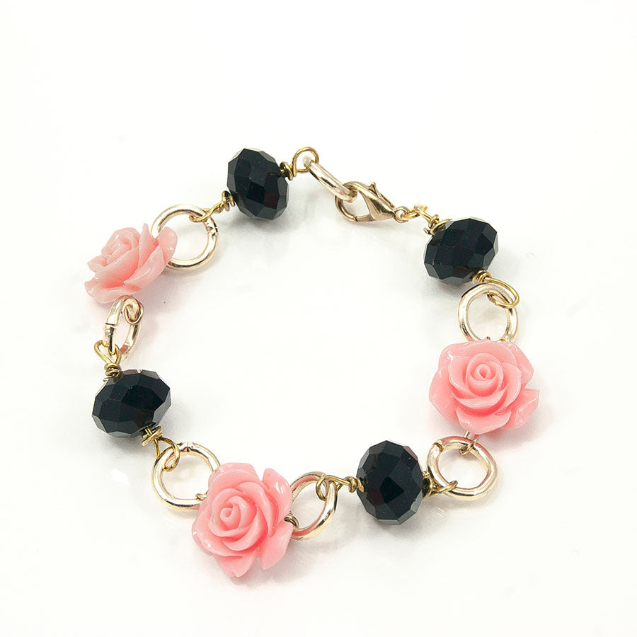 Bracciale LE ROSE .001 metallo dorato, rose rosa, cristalli neri.