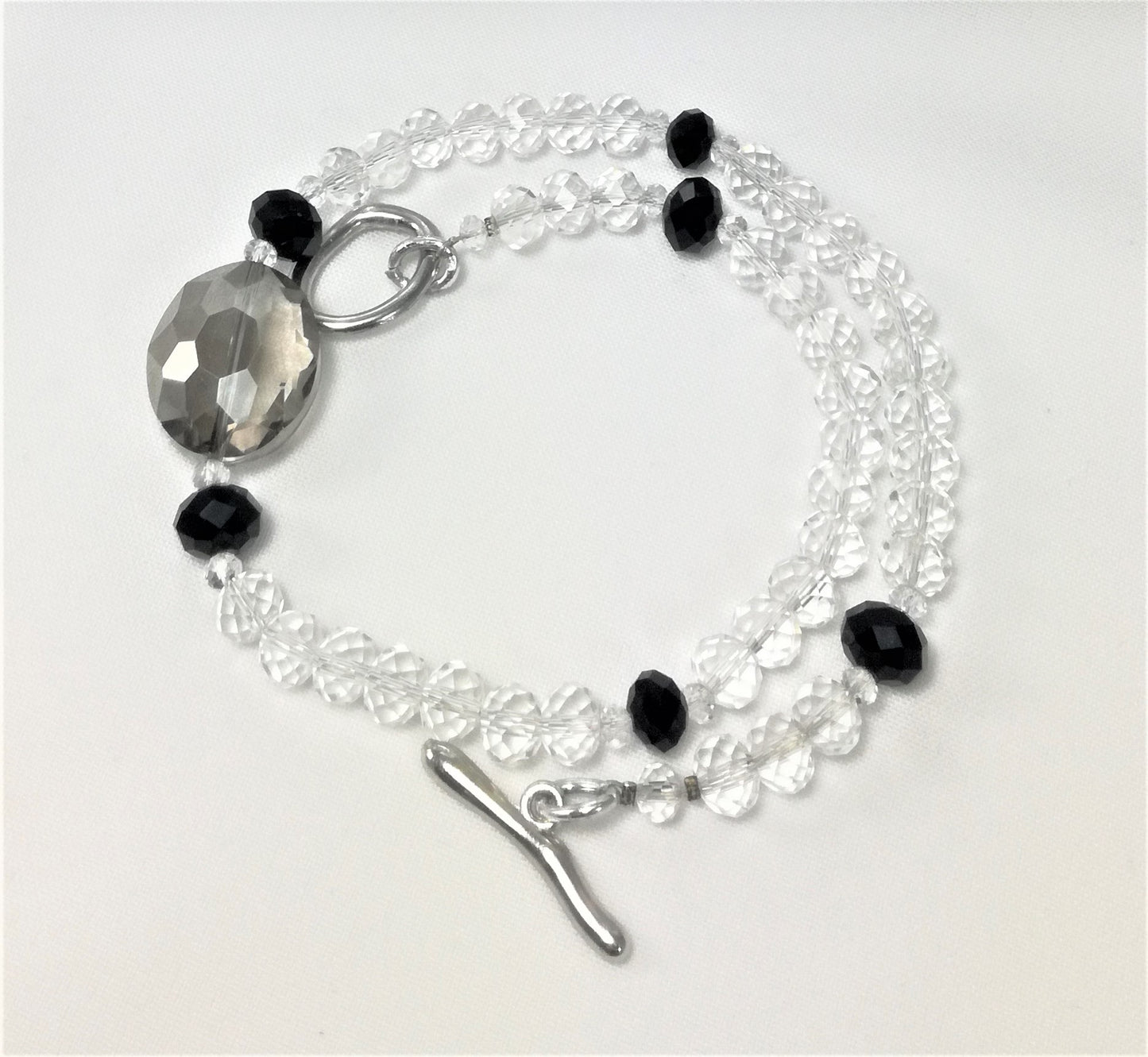 Bracciale I CRISTALLI .019 due giri cristalli neri e trasparenti.