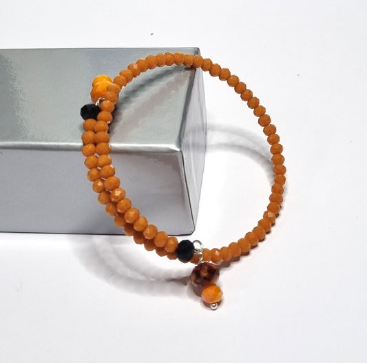 Bracciale I CRISTALLI .105 rigido un giro perline cristallo arancio, arancio semitrasparente e giallo ocra. .