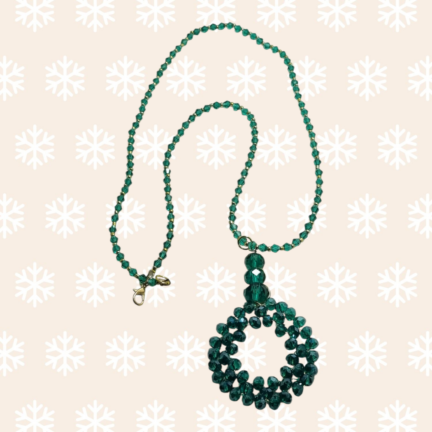 Collana I CRISTALLI .116 Filo piccoli cristalli smeraldo ciondolo rotondo