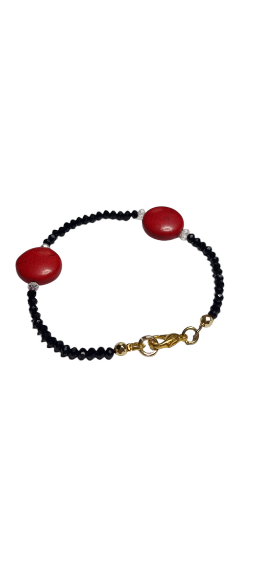 Bracciale LE PIETRE .095dischi rosso sintetico, filo cristallini neri e bottoni pietra rossa