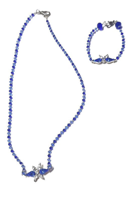 Bracciale I CRISTALLI .087a Piccoli cristalliazzurri/blu elettrico alternati centrale metallo e cristalli in tono.
