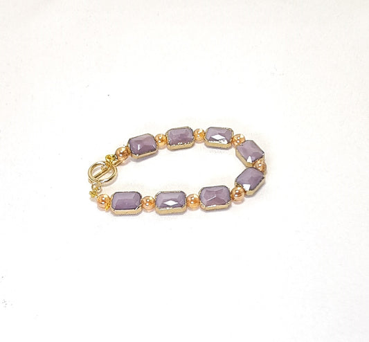 Bracciale I CRISTALLI .096  perle in vetro sfaccettate, incastonate con perle rotonde, lavanda