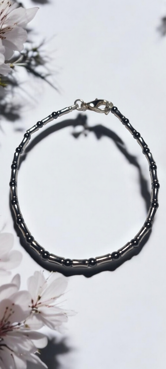 Bracciale UOMO .006  sottile filo di perline, piccoli onici con elementi tubolari