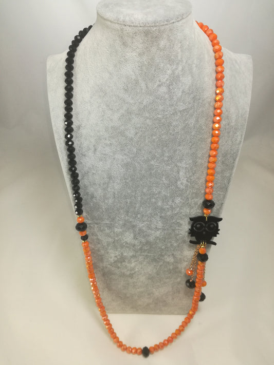 Collana I CRISTALLI .087  cristalli arancio, nero, gufo nero plexiglass e cristalli pendenti.