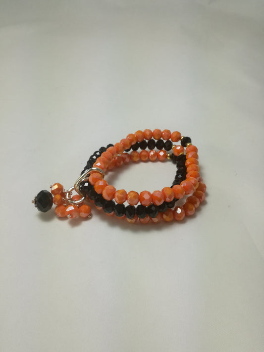 Bracciale I CRISTALLI .083 fili elastici cristalli arancio, nero.