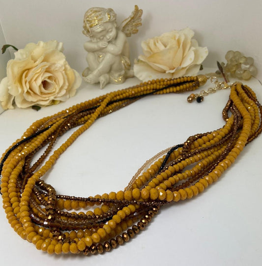 Collana I CRISTALLI .075 Collier 11 fili cristalli giallo ocra, bronzo e brown , finitura in metallo dorato