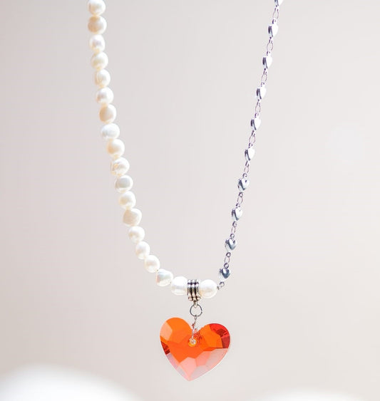 Collana AMORE .066 filo perle e acciaio, cuore rosso sw