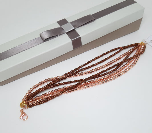 Bracciale LE PERLE .045  ematite oro rosa e  rocailles