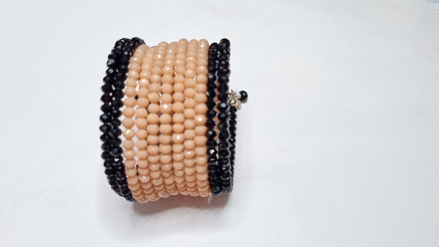 Bracciale I CRISTALLI .087 spirale cristalli salmone e neri.