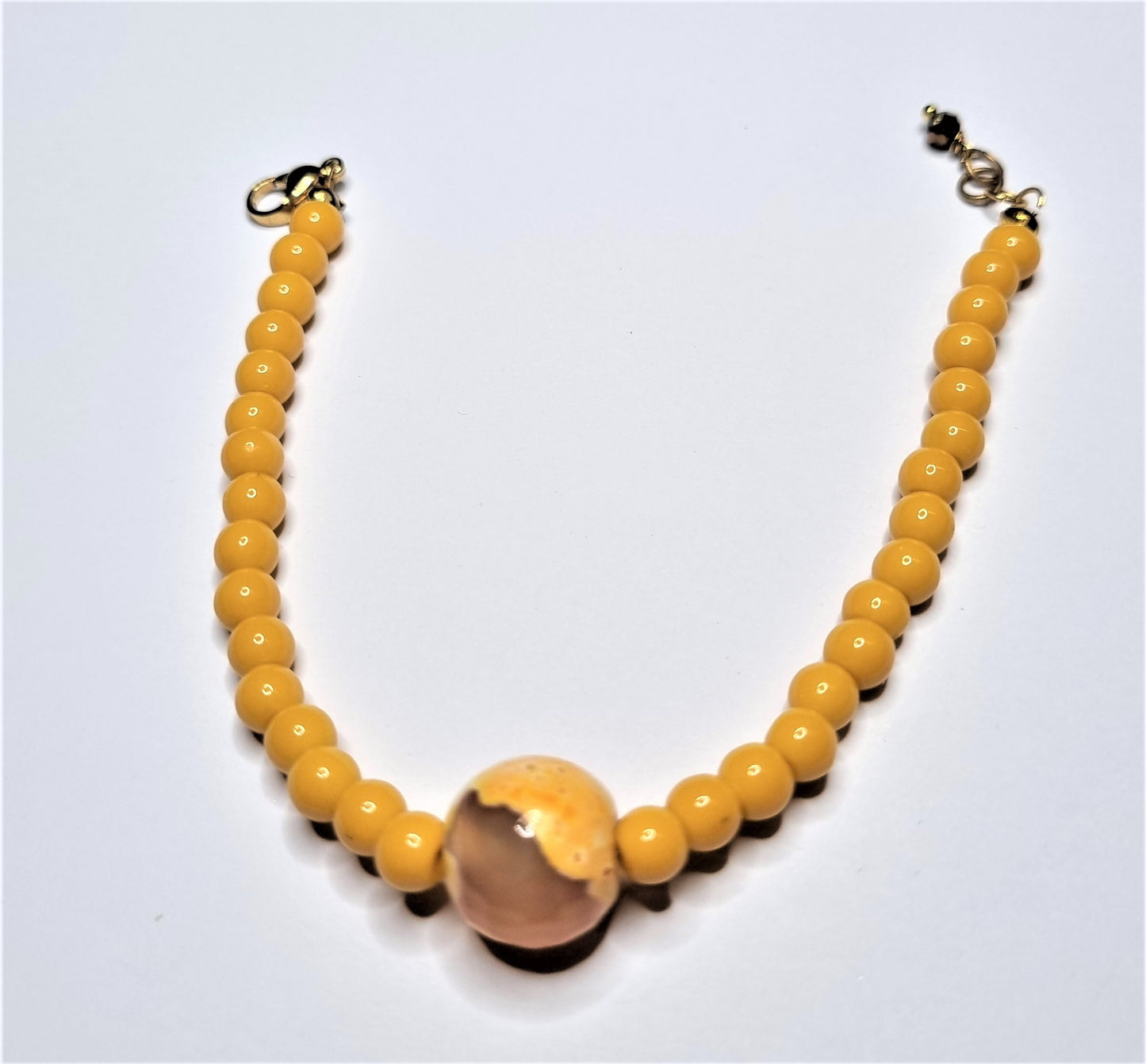 Bracciale LE PERLE .049  perle colore giallo centrale diaspro.