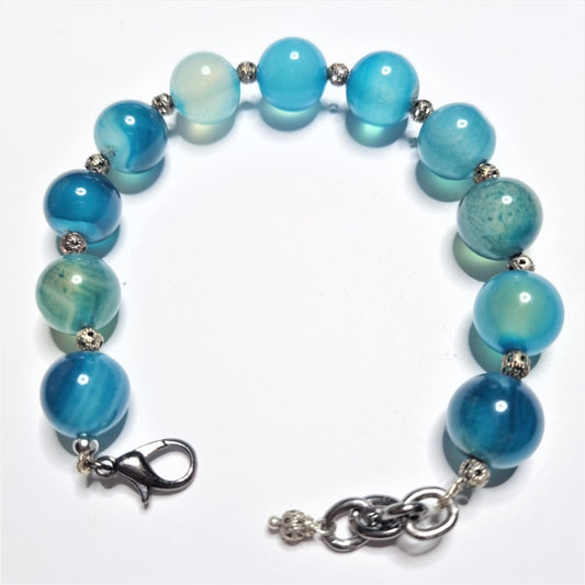 Bracciale LE PIETRE .015 perle di agata azzurra, metallo filigranato.