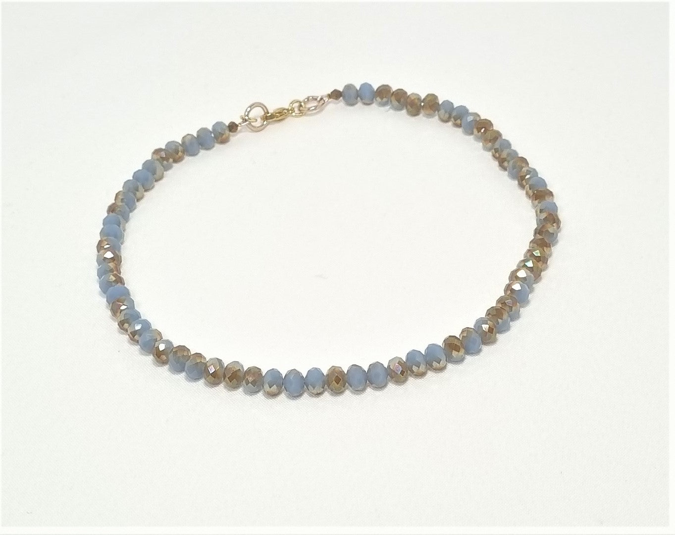 Collana I CRISTALLI .064 un filo cristalli azzurro melange