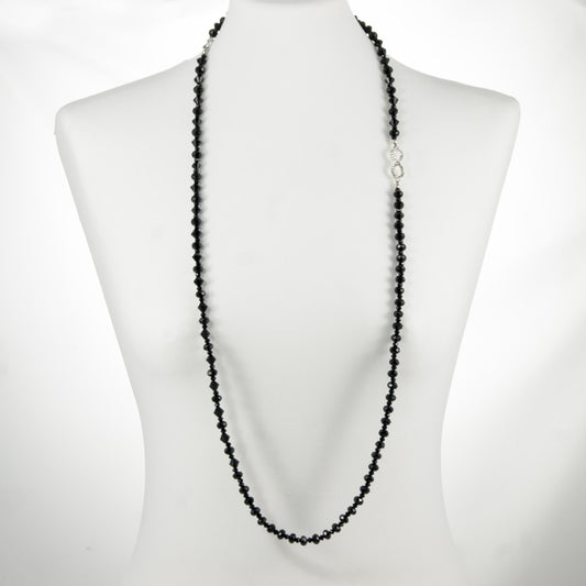Collana LUCEOMBRA .009, unico lungo filo di cristalli neri. motivo infinito metallo e strass.