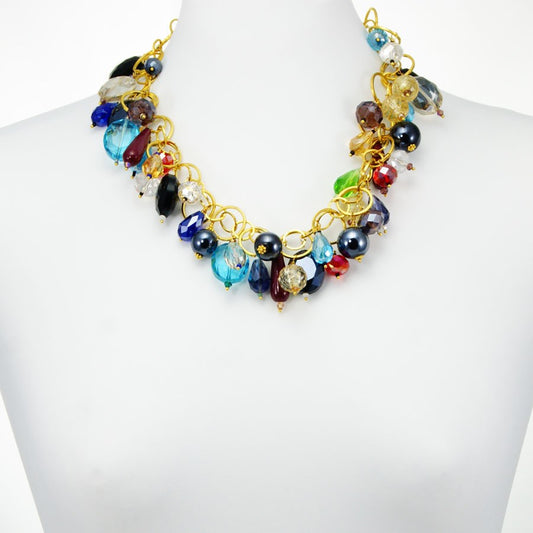 Collana I CRISTALLI .099,  OUTLET anelli dorati varie misure con cristalli multicolori e multiformi sospesi.