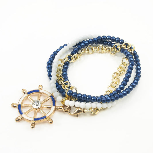 Bracciale SOPHIA .008,   perline bianche blu con catenella.