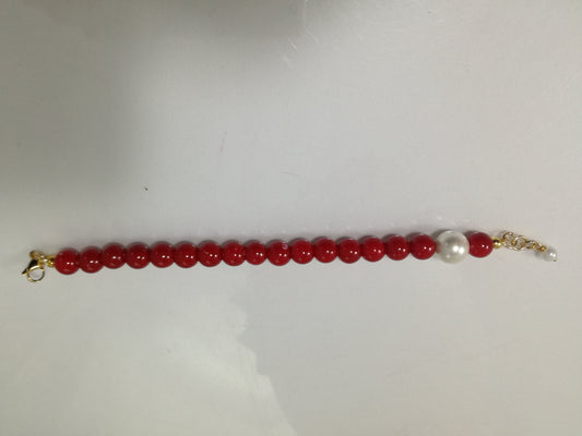 Bracciale I ROSSI .016   perle rosse  chiusura dorata.